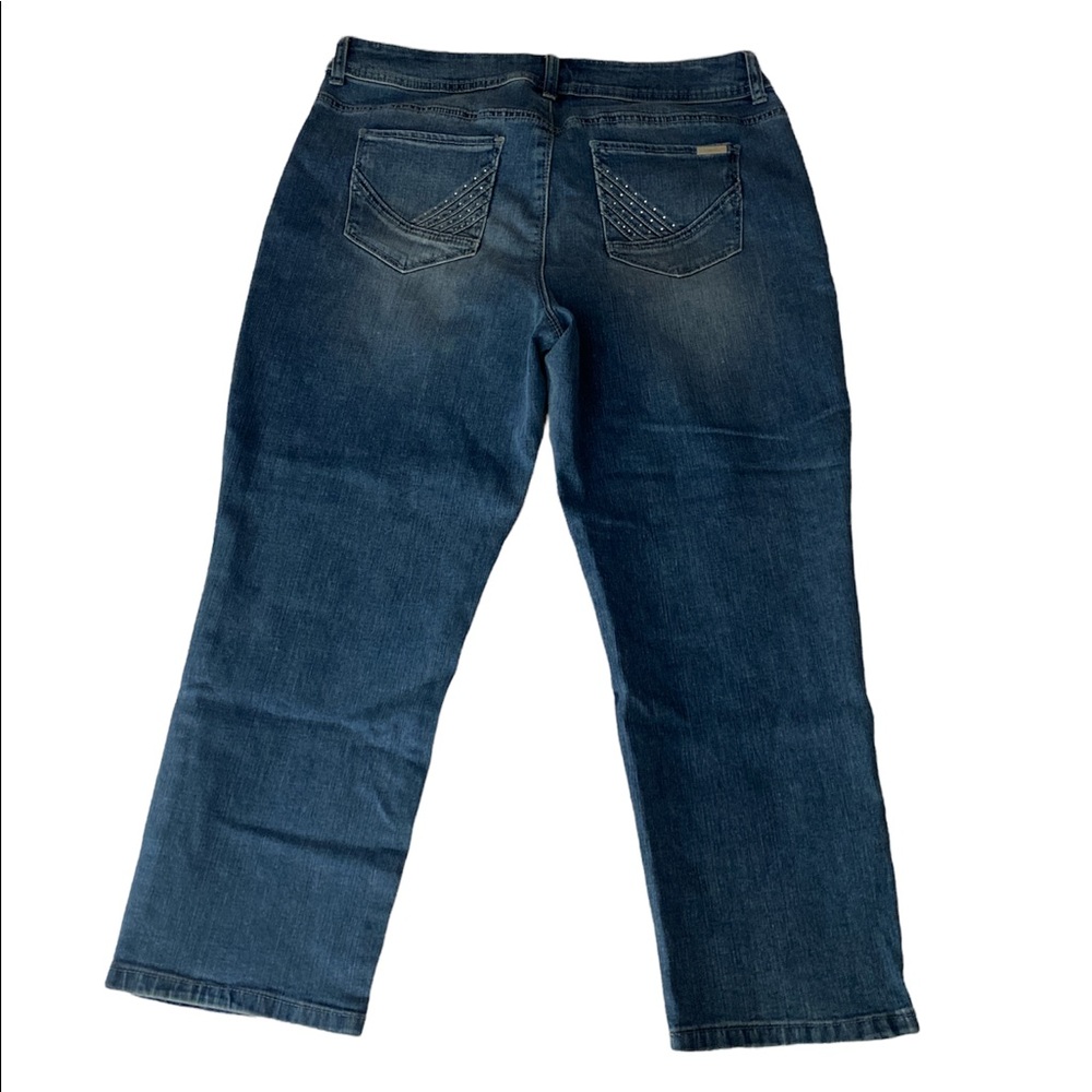 Brand new So Slimming By Chico’s blue wash crop jeans.